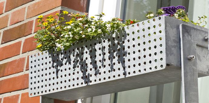 Dekorative perforerede plader anvendt til balkoner og altankasser
