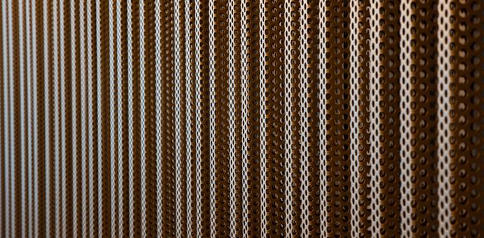 Attractive interior cladding using perforated metal